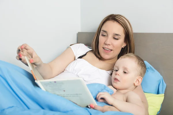 Mother reading a story to her son