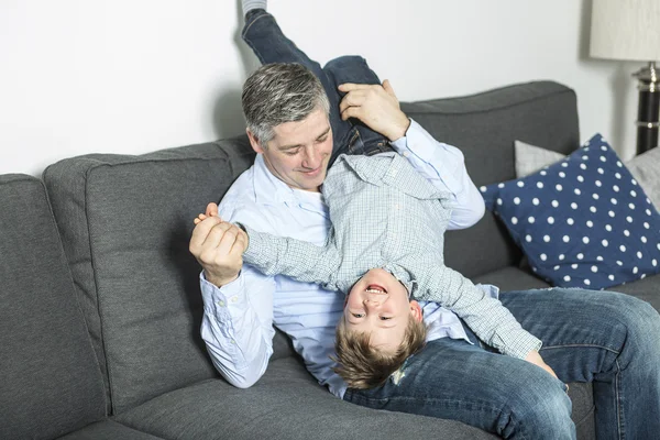 Nice family sit on the livingroom sofa