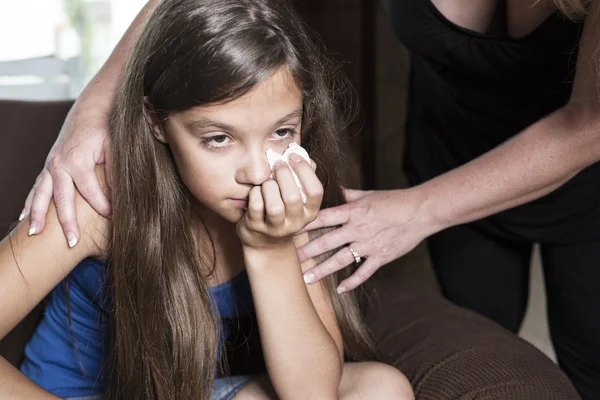 Girl sad tears with tissue