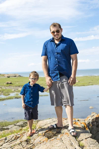 Father And Son Hugging On Outdoor summer