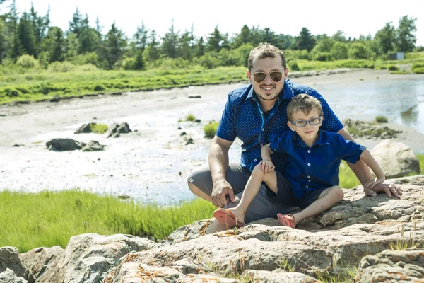 Father And Son Hugging On Outdoor summer