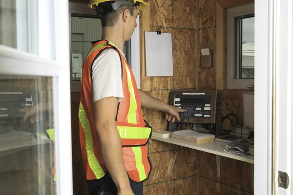 A worker who recycling thing on recycle center