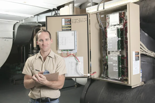 A Air Conditioner Repair Man at work