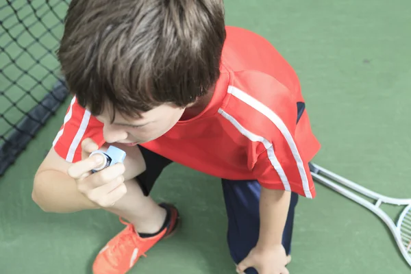 Boy tennis player learning how to preparing to play tennis