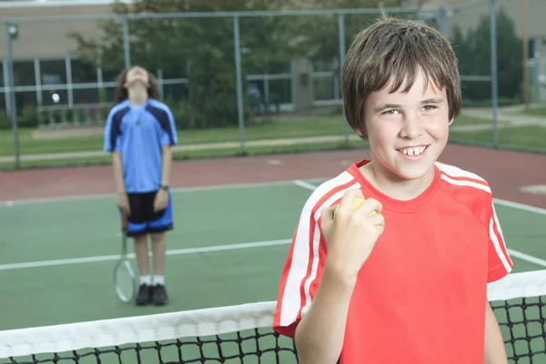 Boy tennis player learning how to preparing to play tennis