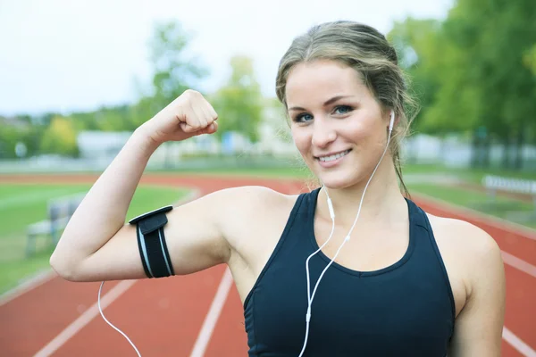 A Runner woman jogging on a field outdoor shot