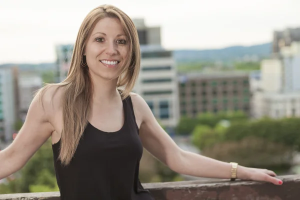 Closeup portrait of beautiful, happy, relaxed woman Urban life