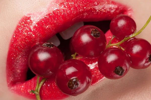 Red lips with red currant.