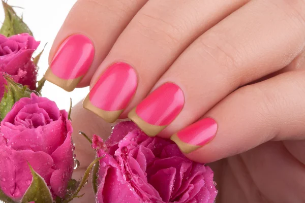 Pink nail polish.