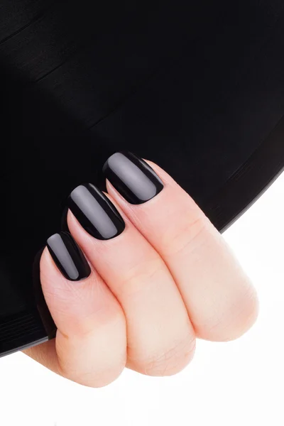 Very beautiful black nails close up.