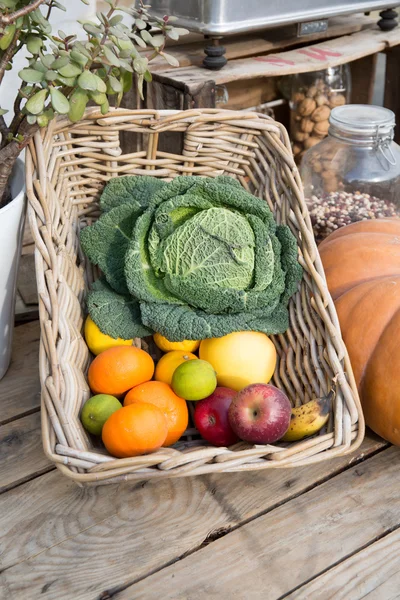 Apple cabbage coleslaw and fresh fruit on sale from greengrocers