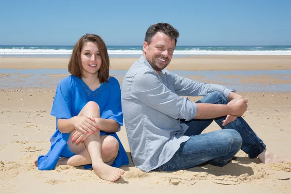 Cheerful and smiling Couple Enjoying Beach Holiday