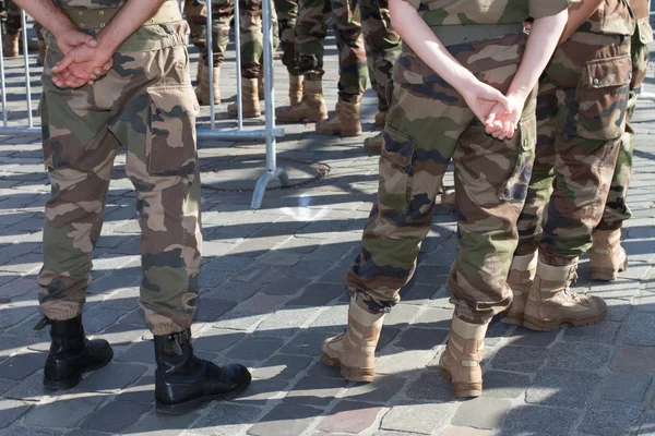 Army - military boots, soldiers standing in line