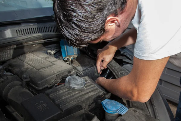 Man is broken his engine car