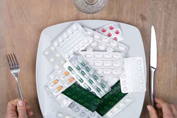 Pills in a plate instead of food