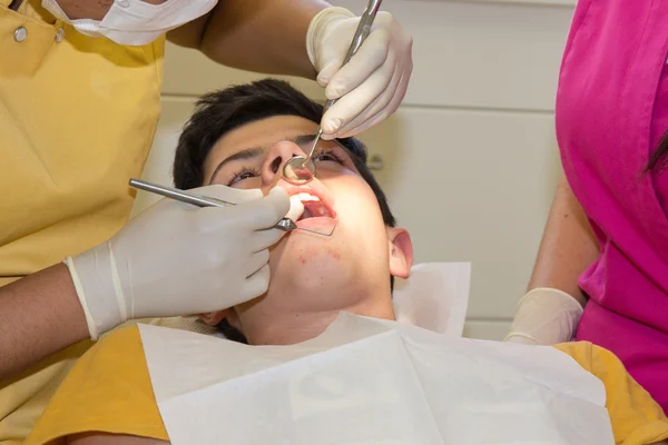 Teenager at dentist