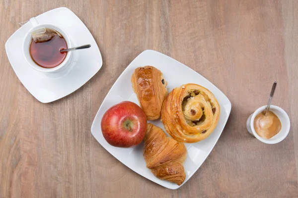 Coffee and tea, a morning breakfast with sweets