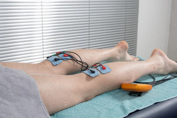 Electrodes on the body of the man