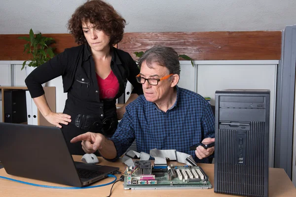 Man and woman working on computer in the laboratory