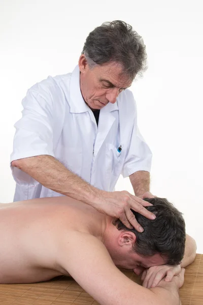 Man having a neck and head massage