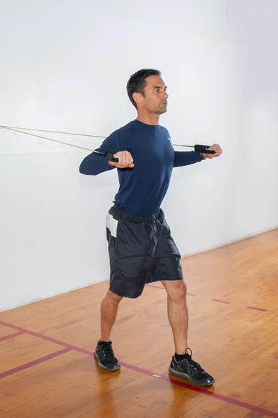 Resistance band exercise for chest and arm strength