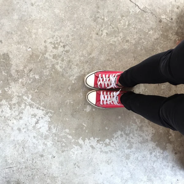 Feet From Above Concept, Teenage Person in Red Sneakers