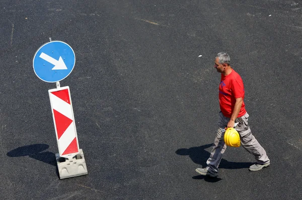 Workers on a road construction