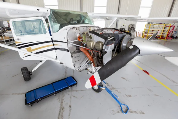 Repairing small propeller airplane