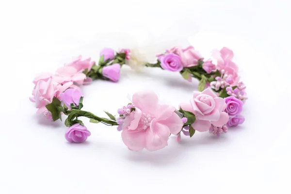 Wreath of pink flowers on a white background