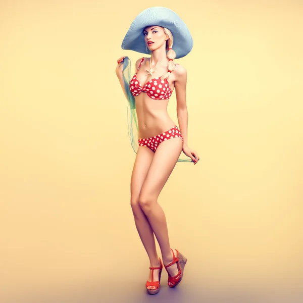 Fashion. PinUp model woman in Beach Bikini. Summer