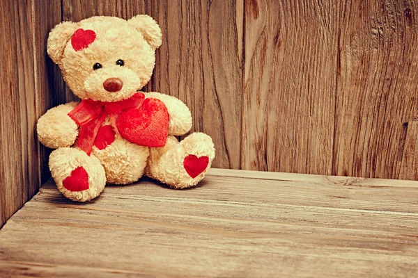 Valentines Day. Teddy Bear Loving with hearts. Love concept. Retro.