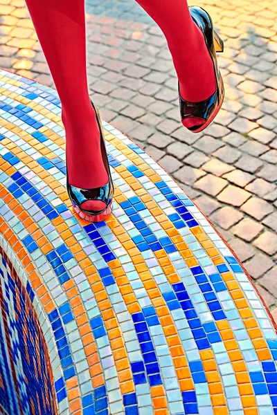 Fashion womens sexy legs, heels. Vivid geometry, people