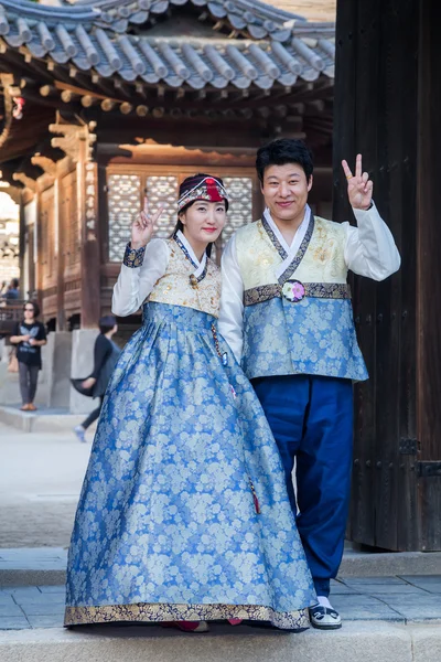 Seoul, South Korea - circa September 2015: Korean couple in traditional dresses in Changdeokgung Palace,  Seoul