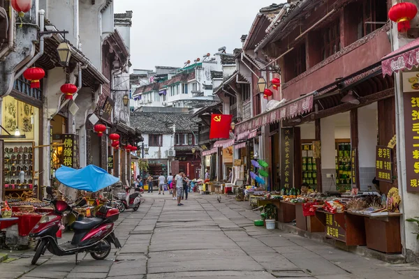 Huangshan Tunxi City, China - circa September 2015: City streets and stores of old town Huangshan in China with oriental  architecture