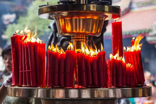 Taipei, Taiwan - circa September 2015: Candles burn in Longshan Buddhist temple in Taipei city,   Taiwan