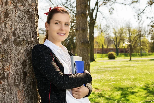 Student portrait in a park