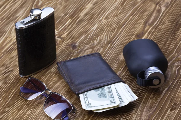 Set of mens accessories: wallet, flask, sunglasses and perfume.