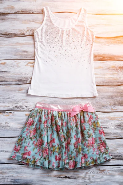 Floral skirt and tank top.