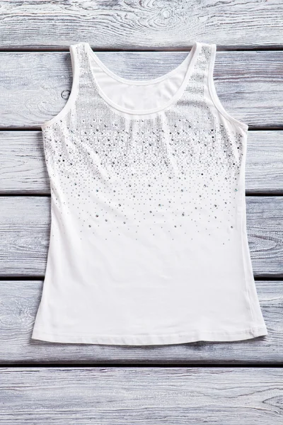 Casual white tank top.