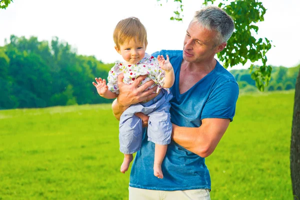 Father and son on a walk.