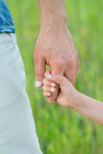 Child's hand.