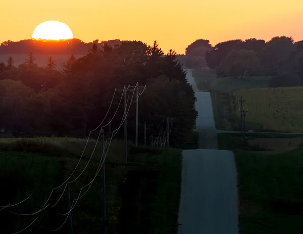 Sunset Over a Country Road