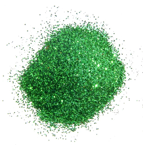 Handful of green glitter sparkle on white background