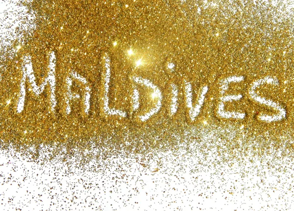 Inscription Maldives on golden glitter sparkle on white background