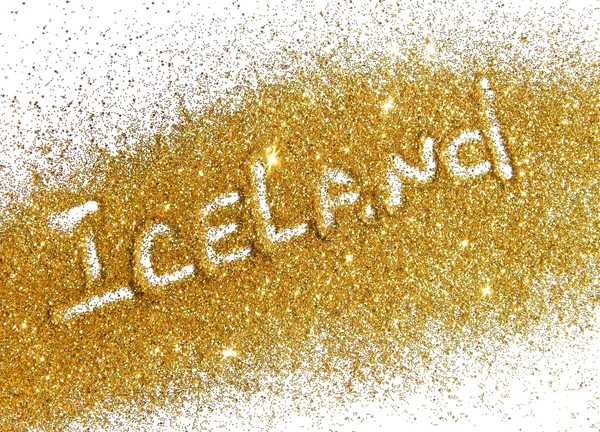 Blurry inscription Iceland on gold glitter sparkle on white background