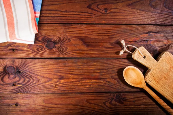 Kitchen accessories on wooden surface. Food background. Space for text.