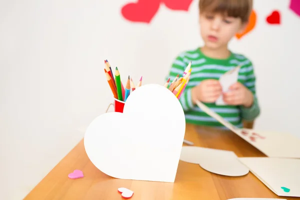 Kids engaged in Valentine\'s Day Arts with Hearts