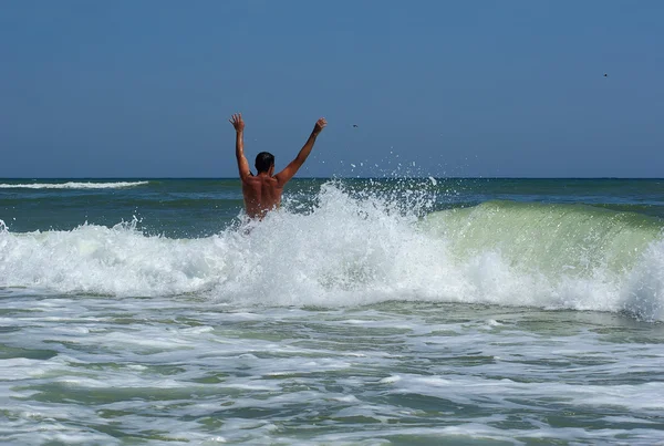 Man bathing in the sea