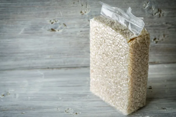 Packaging with Arborio rice on old blue boards