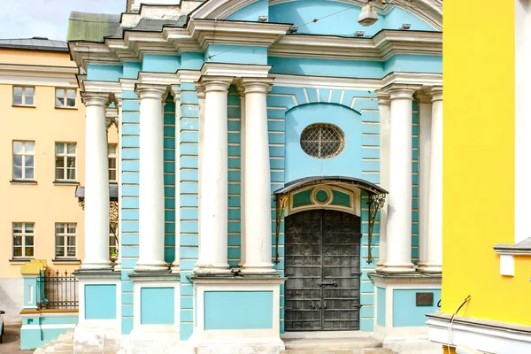 Blue churh with white pillars in Russia